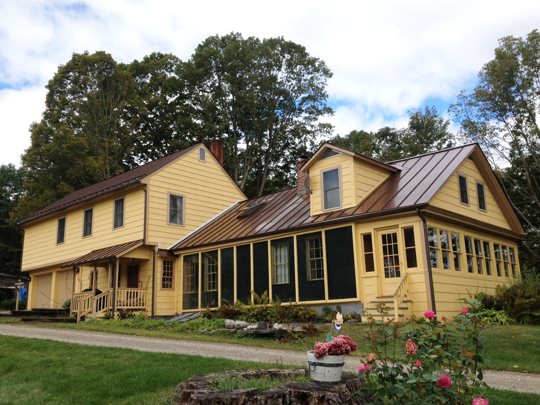 House with a brown metal roof