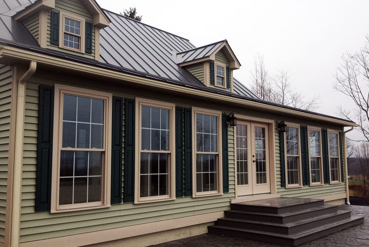 House with seamless gutters installed